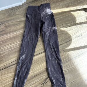 Black and Striped Lululemon WunderTrain Leggings